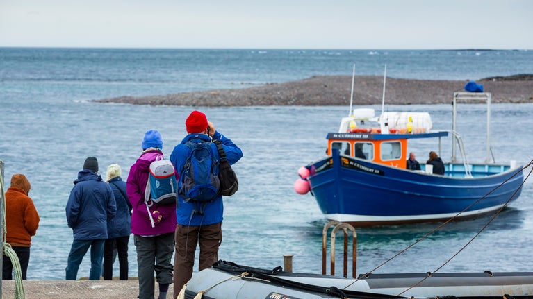 Visitors on the Farne Islands in autumn, Northumberland